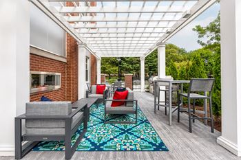 Outdoor patio with grills and fireplace